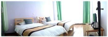 Tranquil Garden Inn Dali Dali Shuanglang ภายนอก รูปภาพ