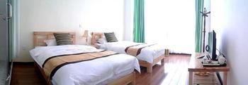Tranquil Garden Inn Dali Dali Shuanglang ภายนอก รูปภาพ