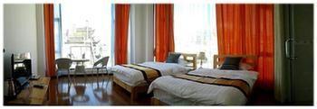Tranquil Garden Inn Dali Dali Shuanglang ภายนอก รูปภาพ